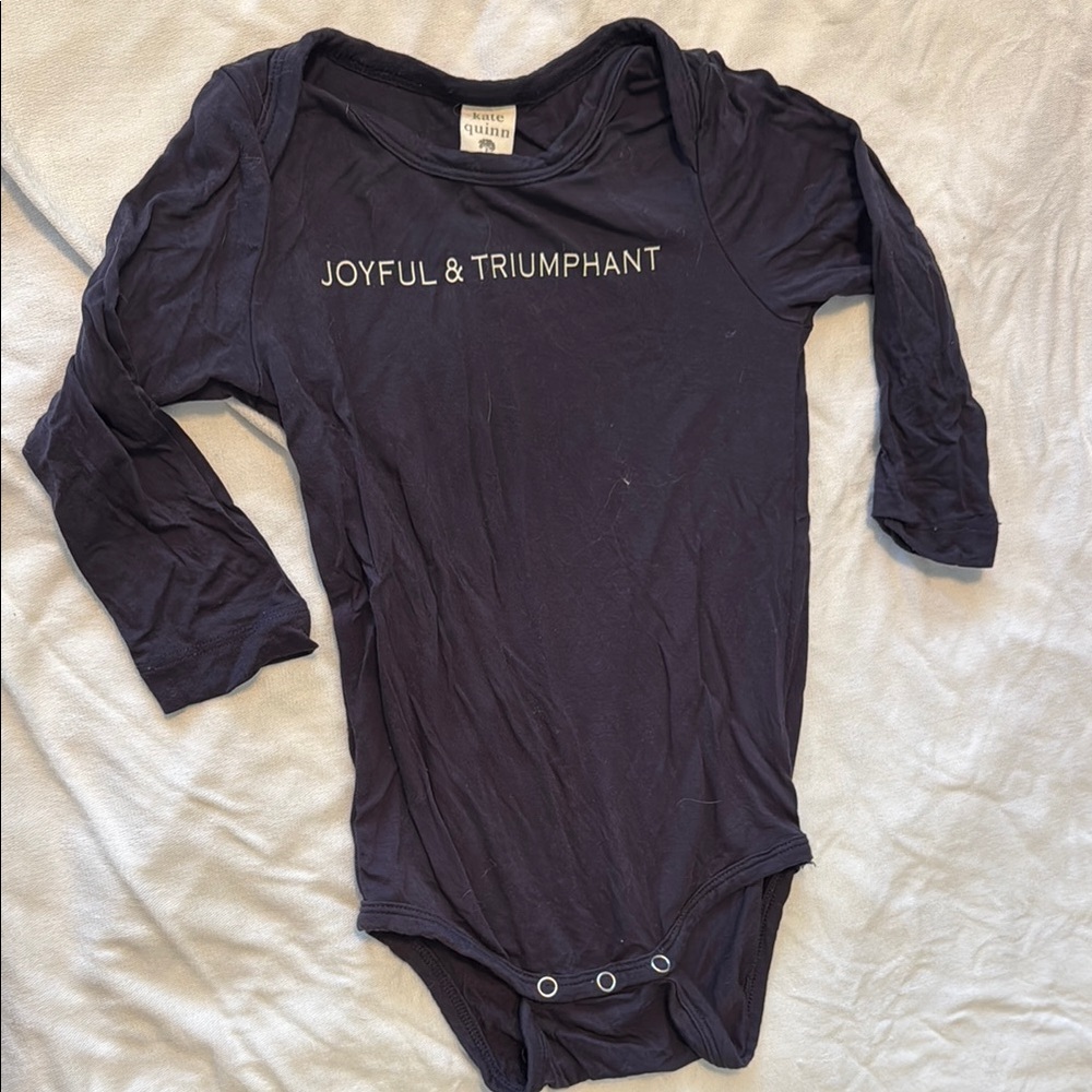 Kate Quinn Black and Blue Bodysuit Joyful & Triumphant